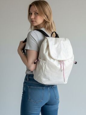 Claire's White Backpack with Pink Drawstring and Black Straps